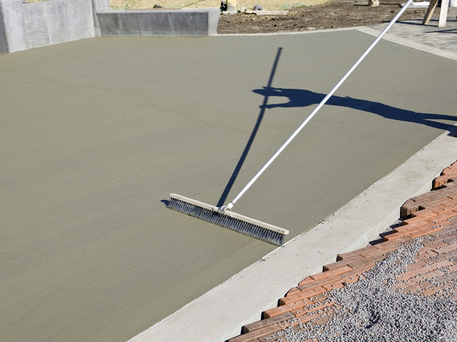 Broom-finished concrete driveway pour on Long Island