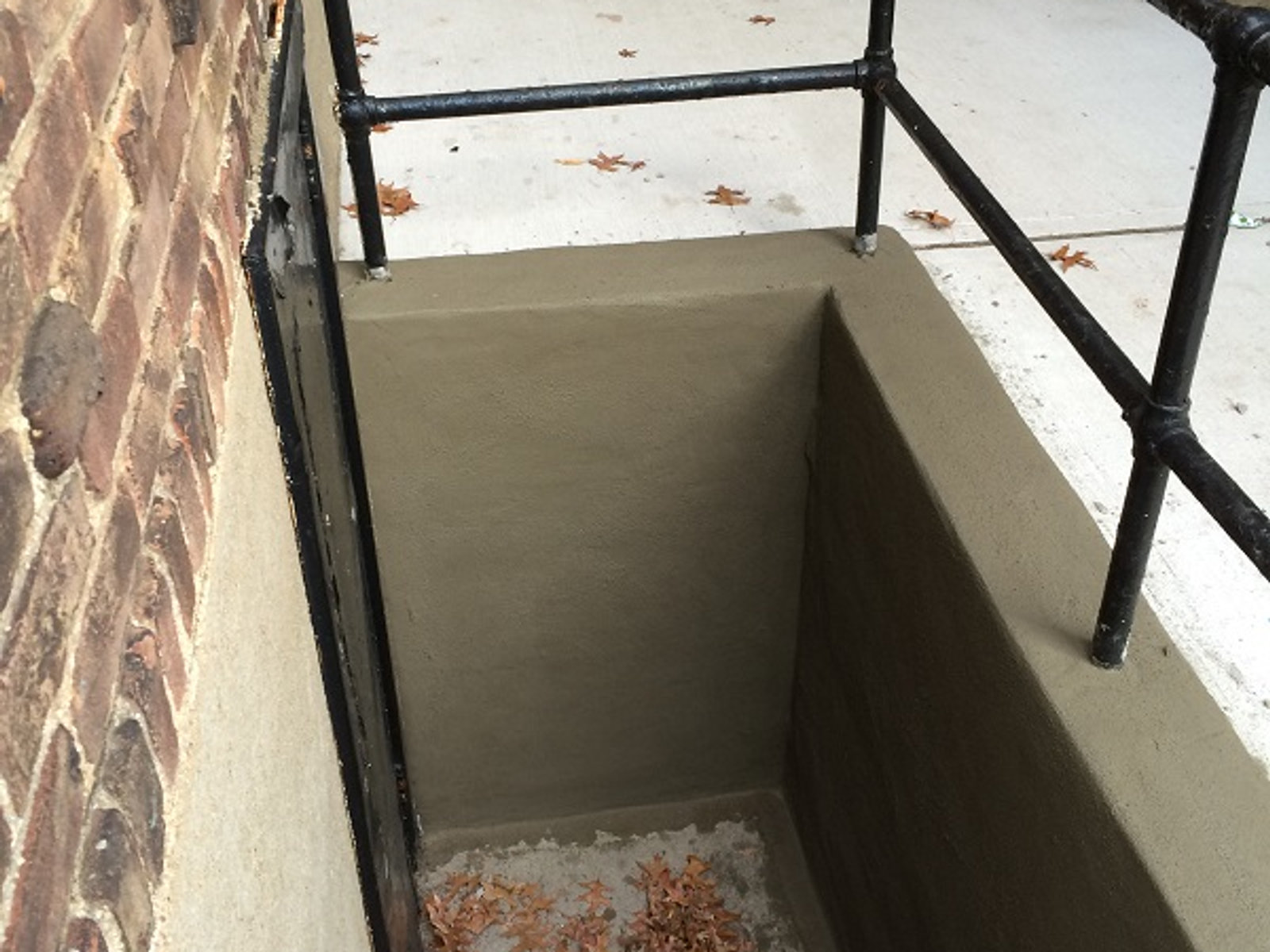 Bluestone-capped basement stairwell rebuilt by Oraco